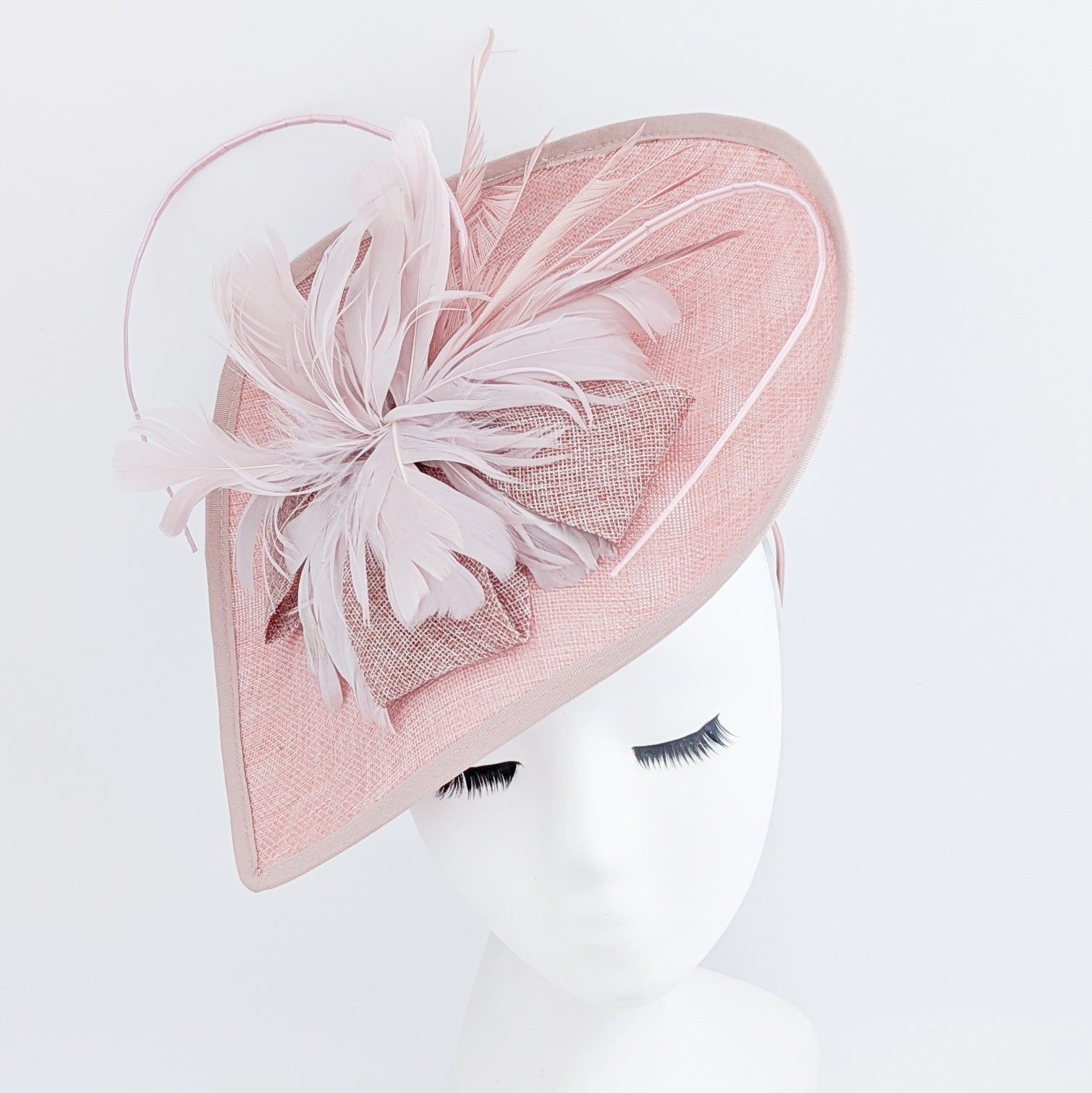 Blush pink large teardrop feather fascinator hat Blush pink large teardrop feather fascinator hat
