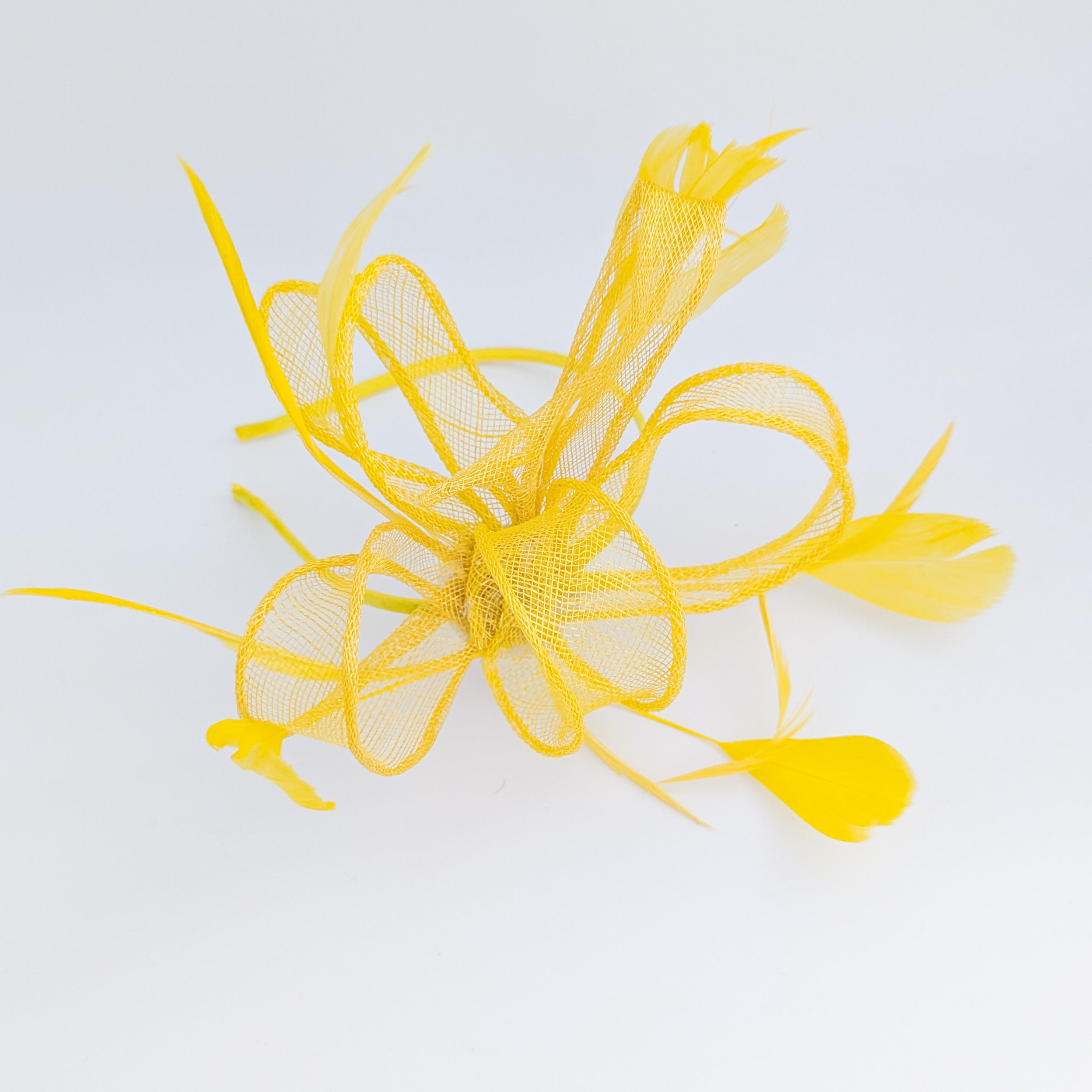 Yellow feather fascinator hat Yellow feather fascinator hat