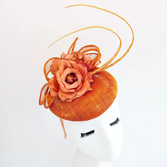 Burnt orange flower fascinator hat House of Hats