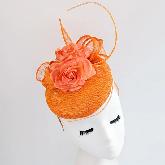 Bright orange coral flower fascinator hat House of Hats