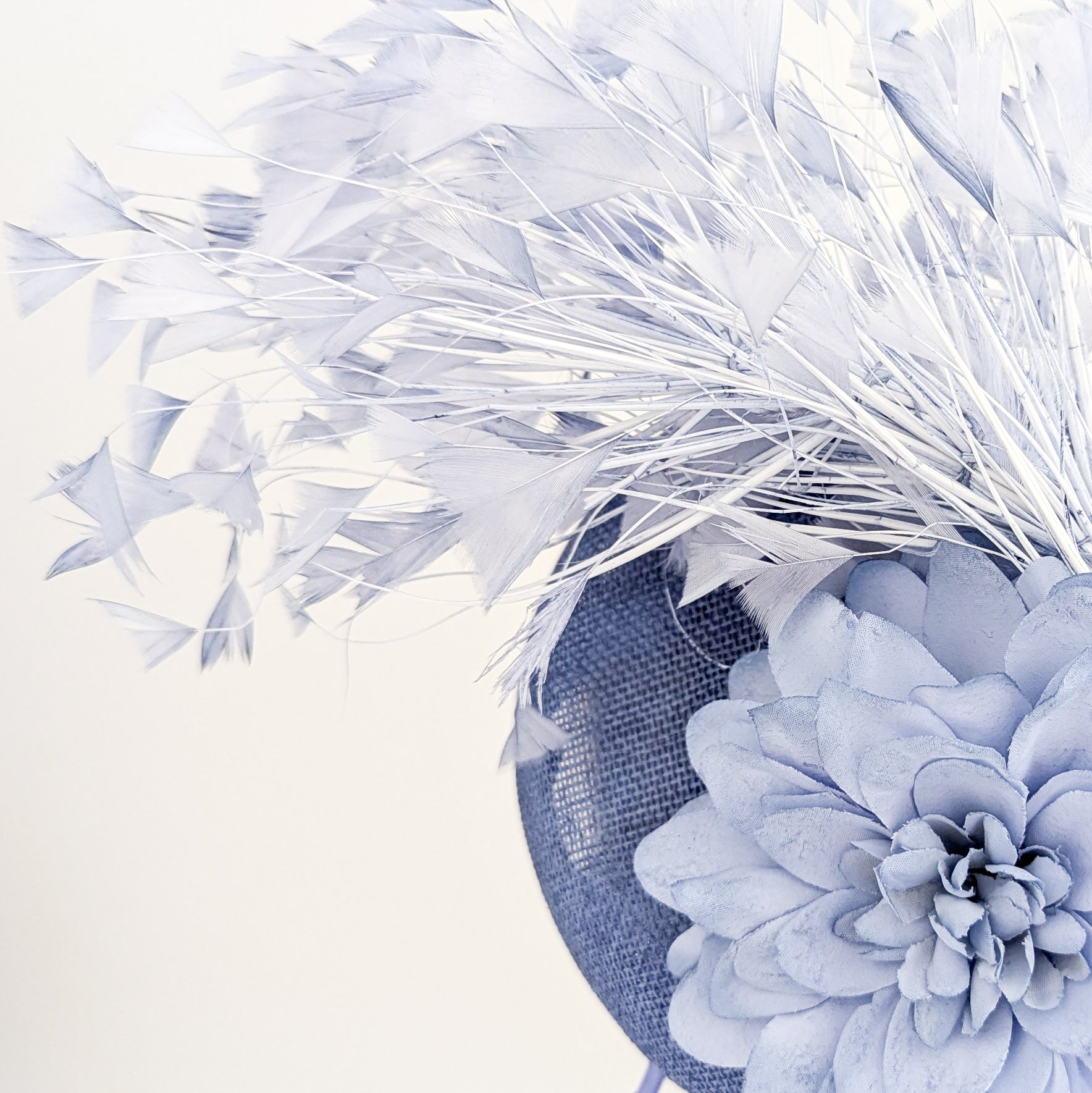 Light dusty purple flower feather fascinator hat Light dusty purple flower feather fascinator hat