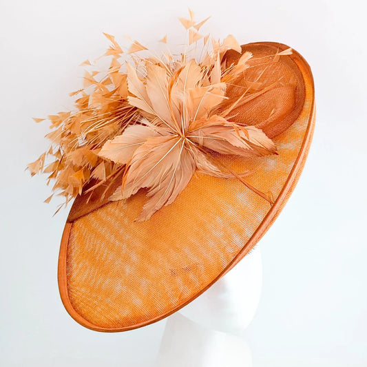 Terracotta dusty orange large feather oval disc fascinator hat House of Hats