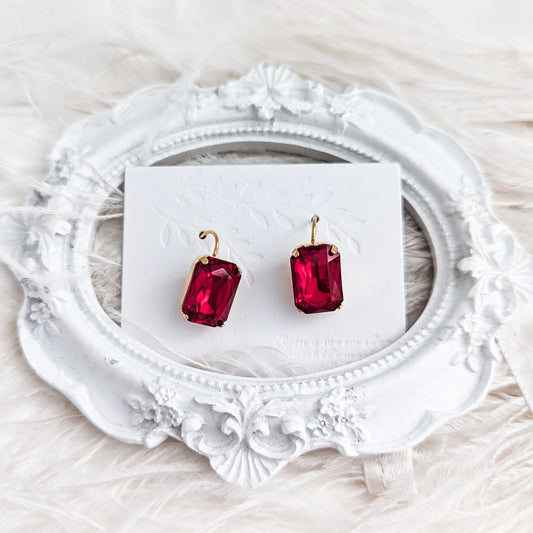 Red crystal gold emerald cut drop earrings