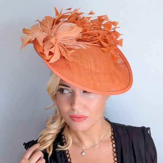 Terracotta dusty orange large feather disc fascinator hat House of Hats