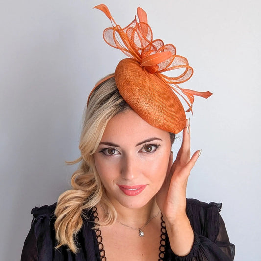 Burnt tangerine orange fascinator hat House of Hats