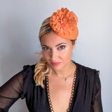 Light orange flower fascinator hat Light orange flower fascinator hat