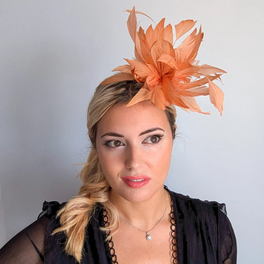 Light orange ombre feather fascinator hat House of Hats