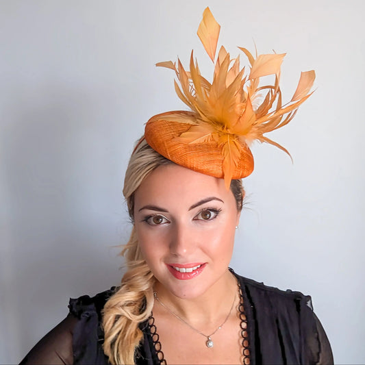 Tangerine orange feather fascinator hat House of Hats