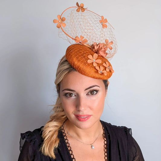 Burnt orange flower fascinator hat House of Hats