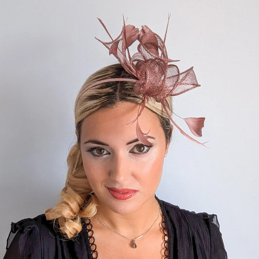 Rose gold shimmer feather fascinator hat House of Hats