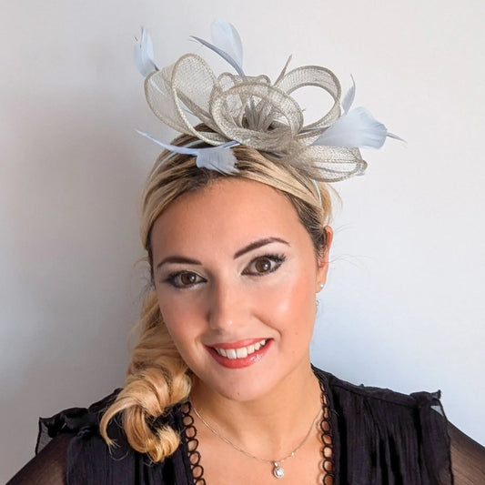 Aquamarine blue feather fascinator hat House of Hats