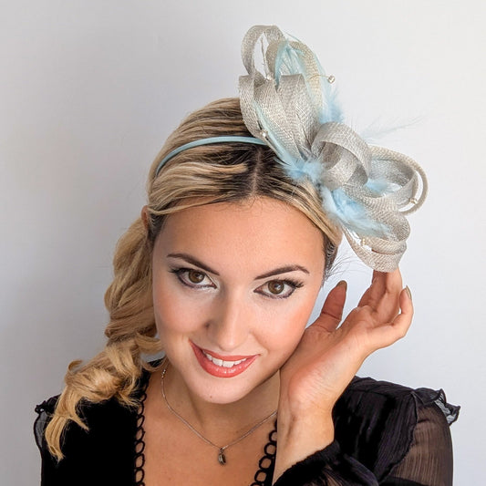 Aquamarine blue crystal feather fascinator hat