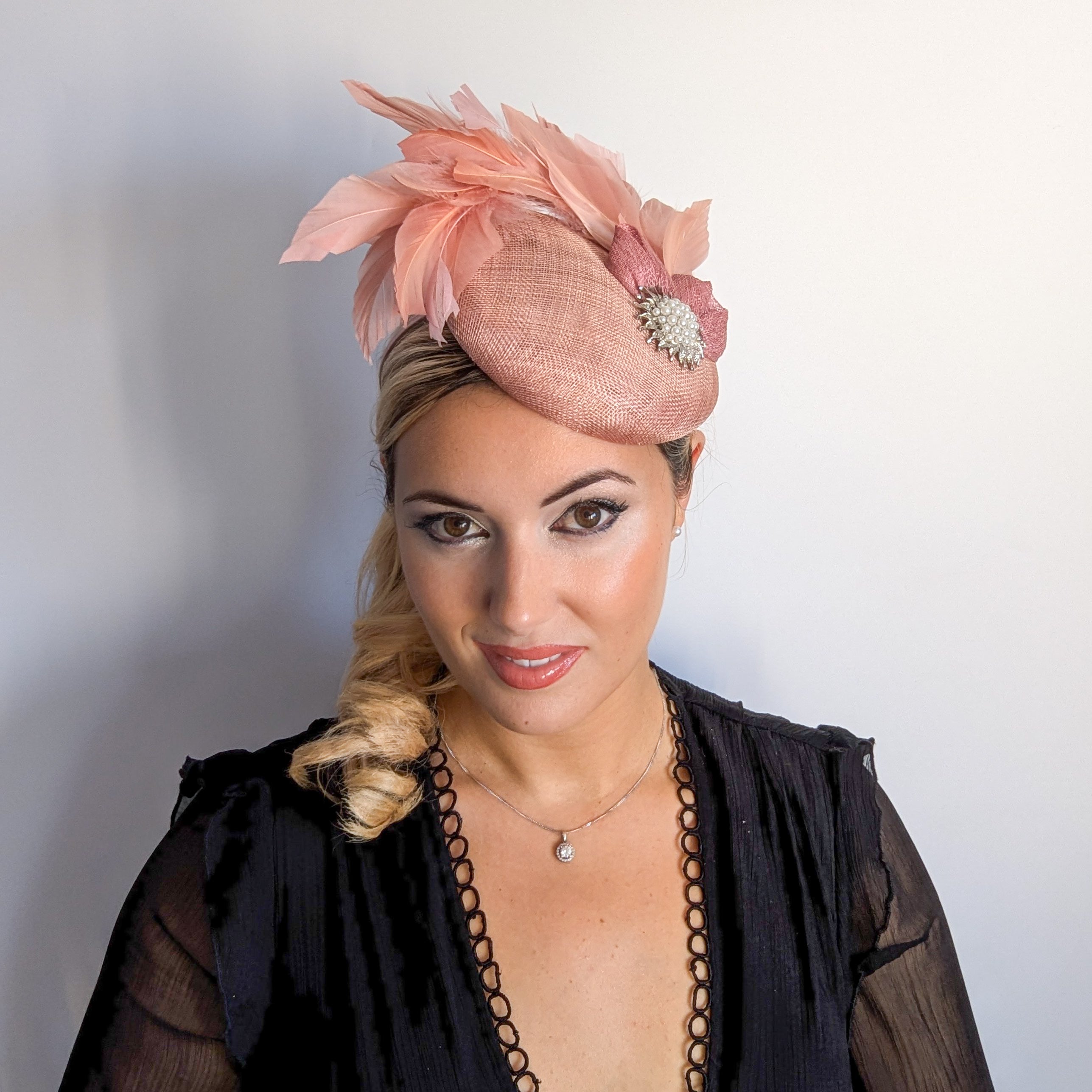 Blush pink feather pearl fascinator hat Blush pink feather pearl fascinator hat