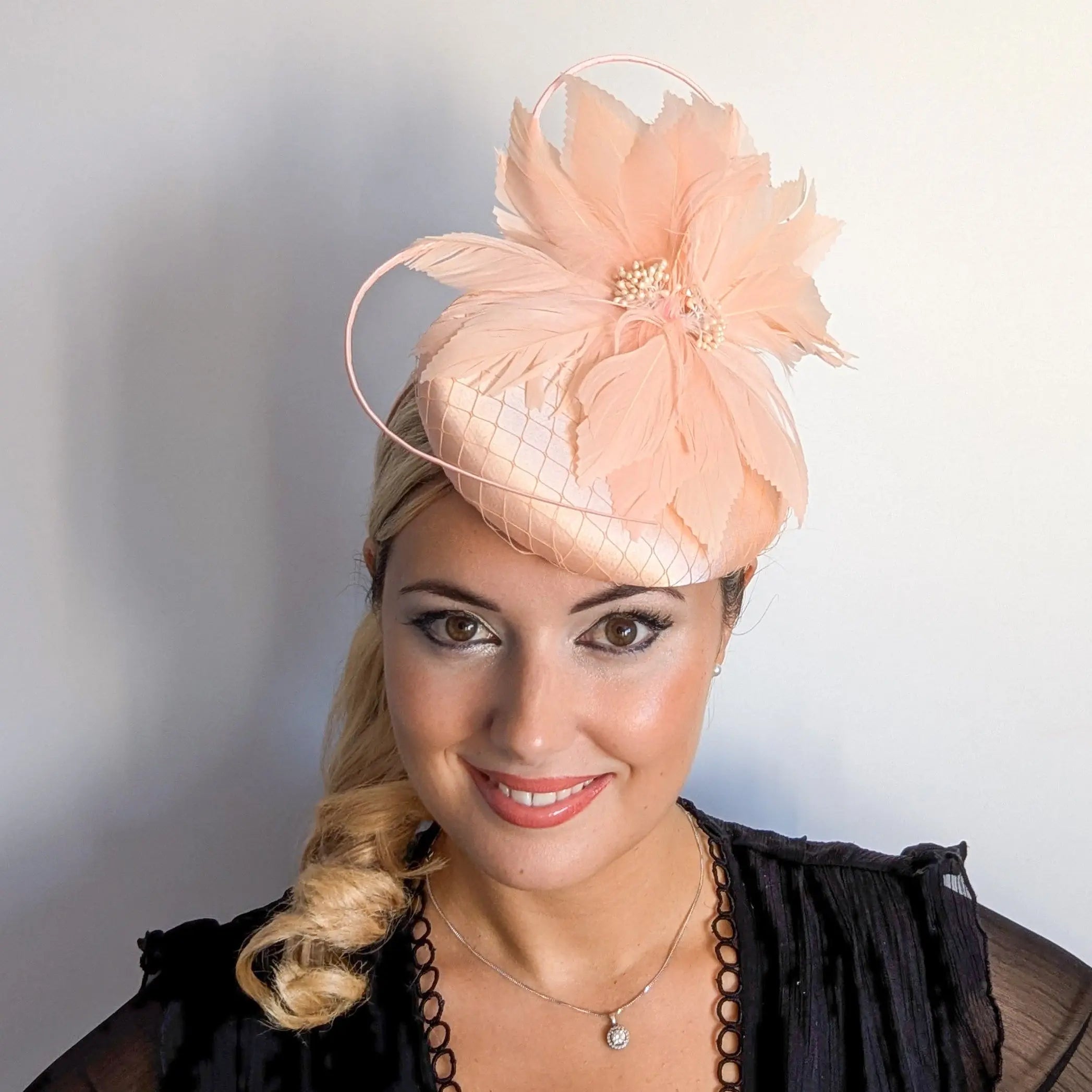 Peach feather satin fascinator hat House of Hats