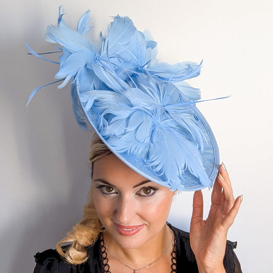 Light cornflower blue large feather saucer disc fascinator hat