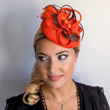 Orange brown feather fascinator disc saucer hat Orange brown feather fascinator disc saucer hat