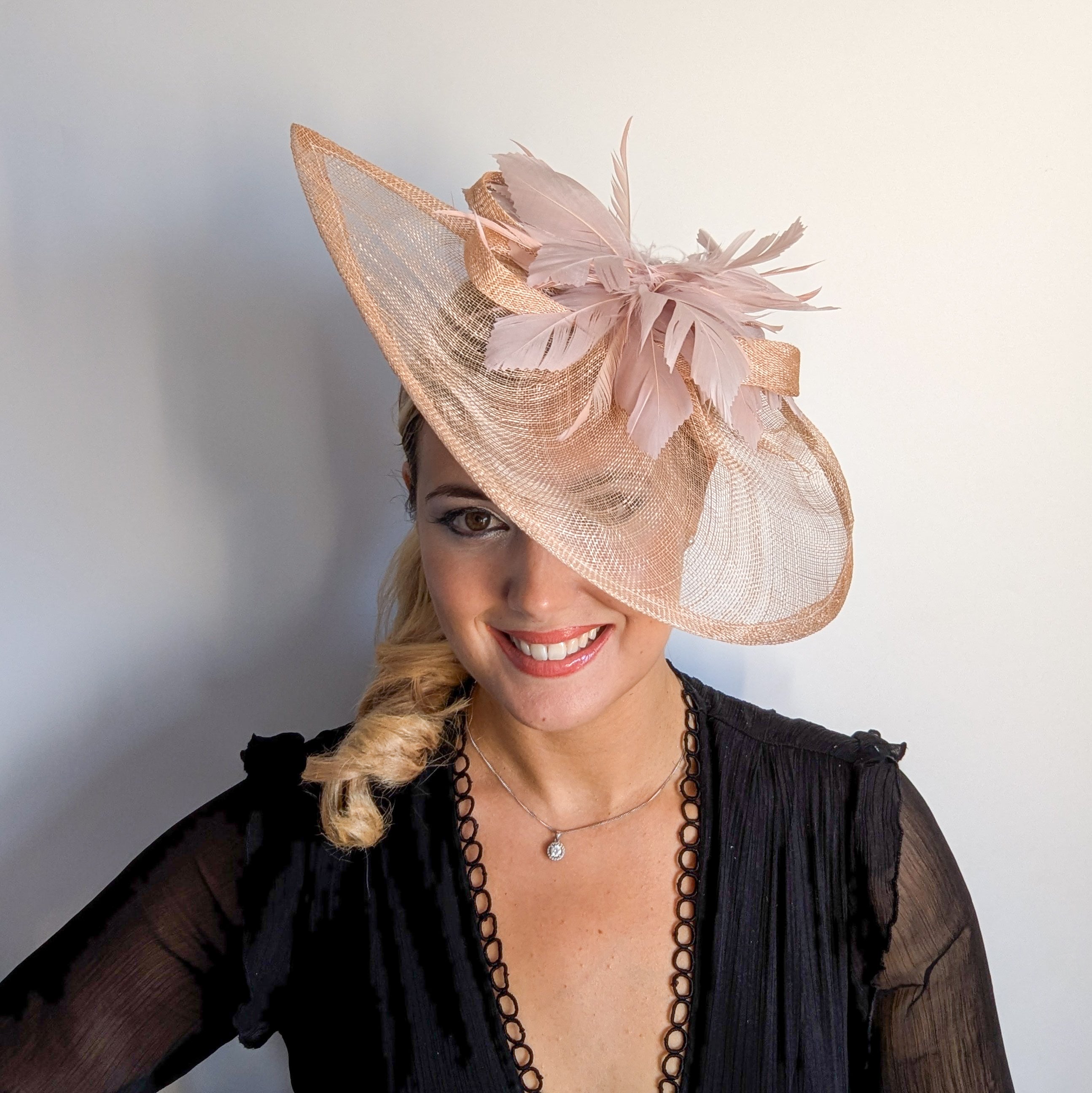 Blush pink feather large teardrop fascinator hat Blush pink feather large teardrop fascinator hat