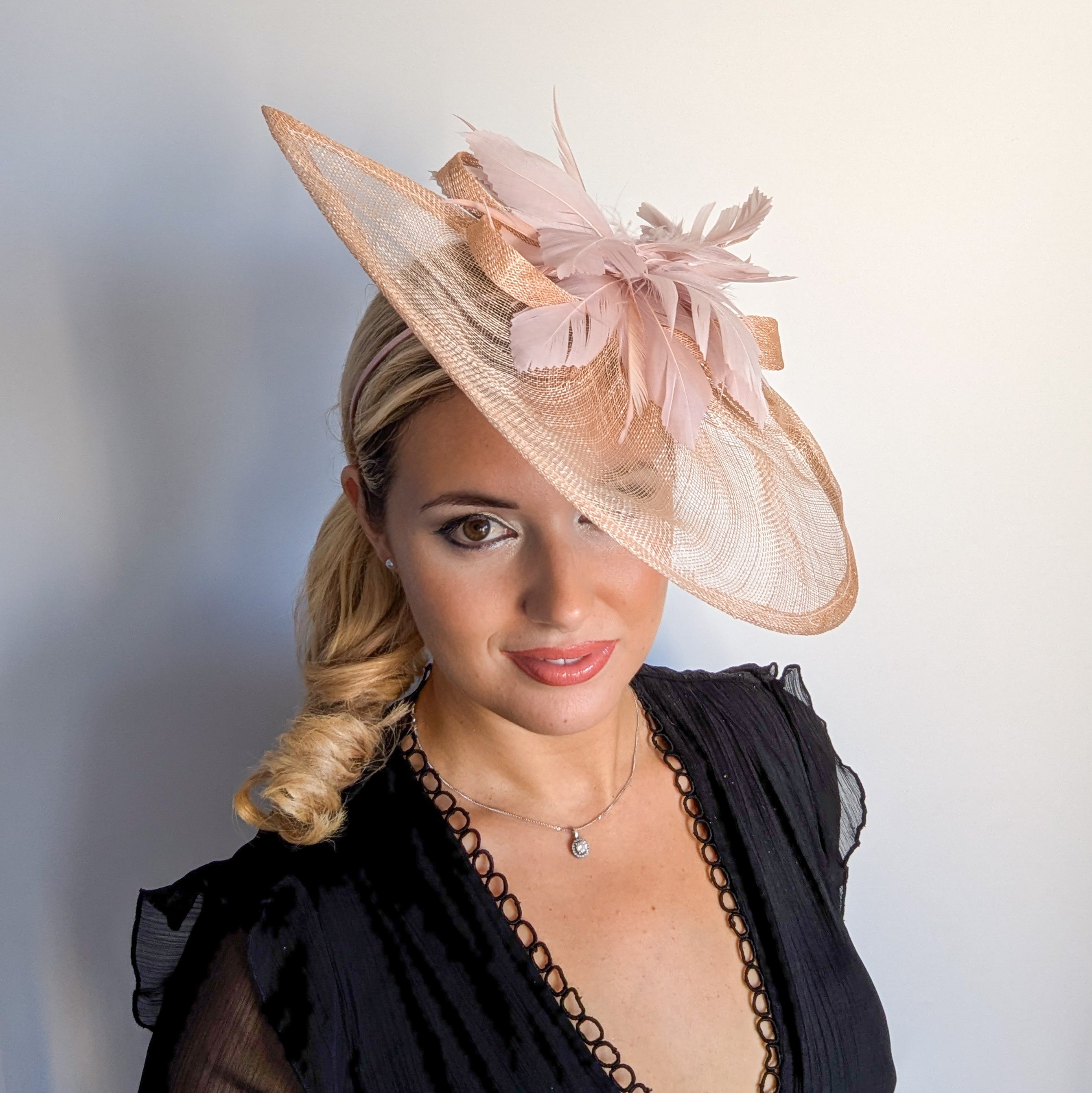 Blush pink feather large teardrop fascinator hat Blush pink feather large teardrop fascinator hat