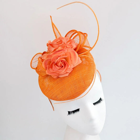 Bright orange coral flower fascinator hat - House of Hats
