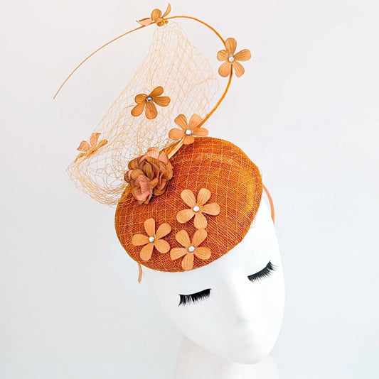 Burnt orange flower fascinator hat - House of Hats