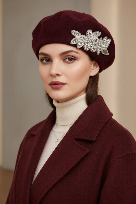 Model wearing a burgundy crystal wool felt French beret hat