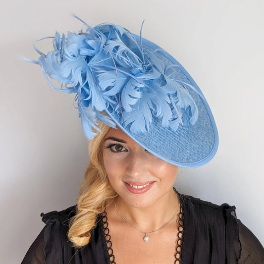 Light cornflower blue large feather saucer disc fascinator hat - House of Hats