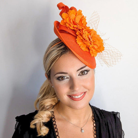 Orange flower fascinator disc saucer hat - House of Hats