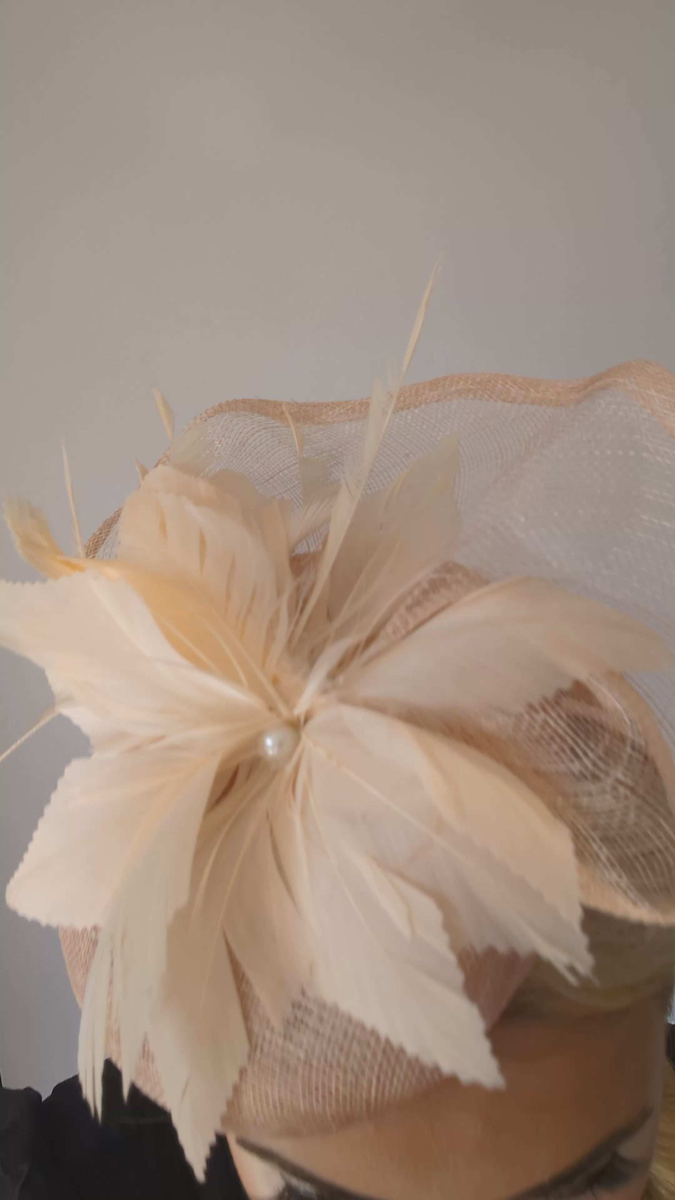 Light peach pink pearl feather fascinator hat