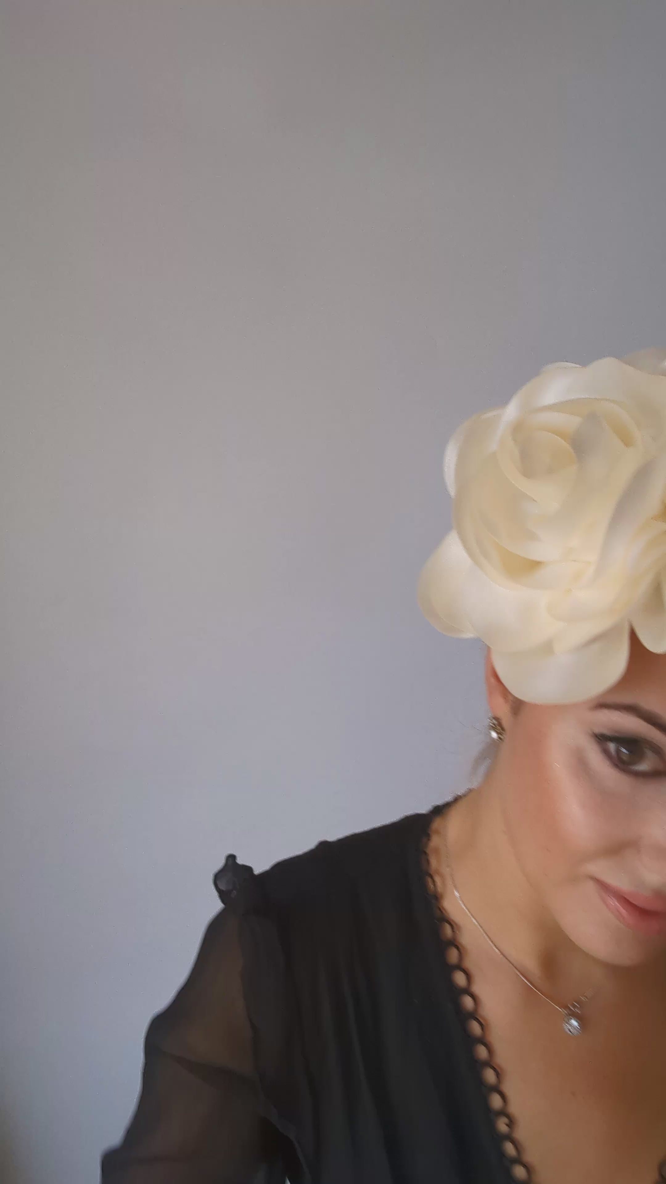 Large cream satin rose fascinator hat Large cream satin rose fascinator hat
