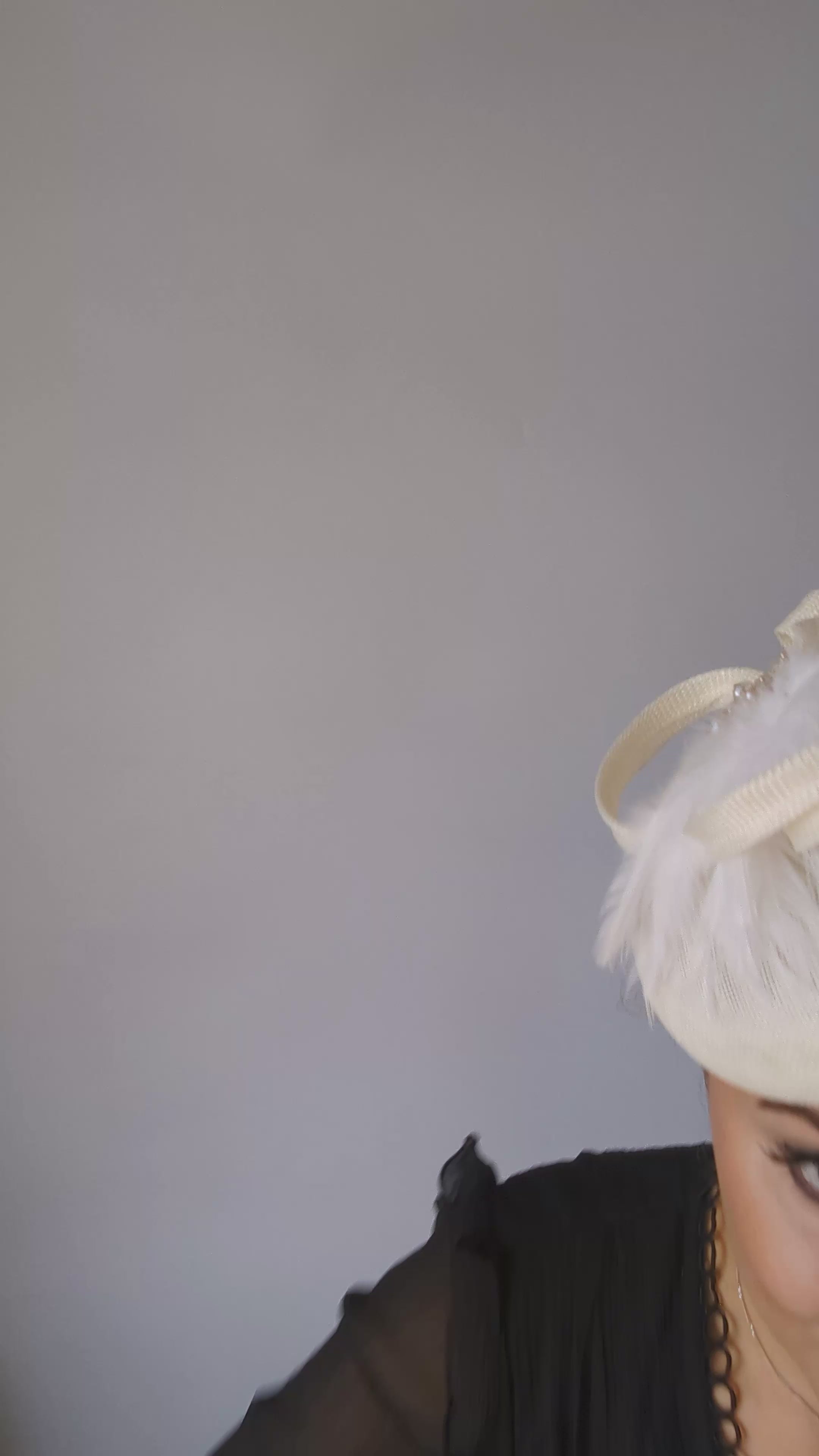 Cream crystal feather fascinator hat Cream crystal feather fascinator hat