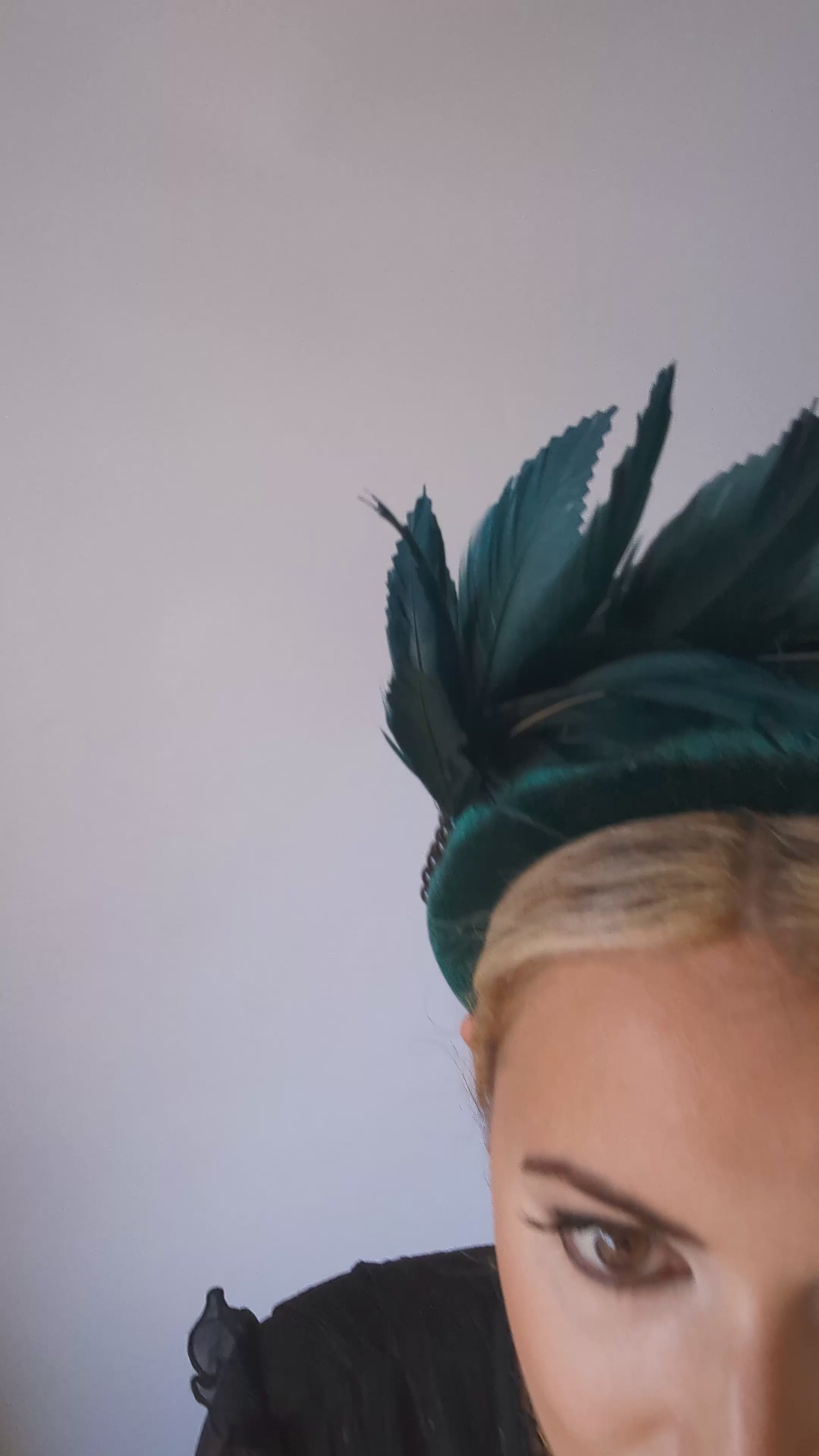 Dark emerald green feather padded velvet headband fascinator