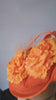 Orange flower fascinator disc saucer hat Orange flower fascinator disc saucer hat
