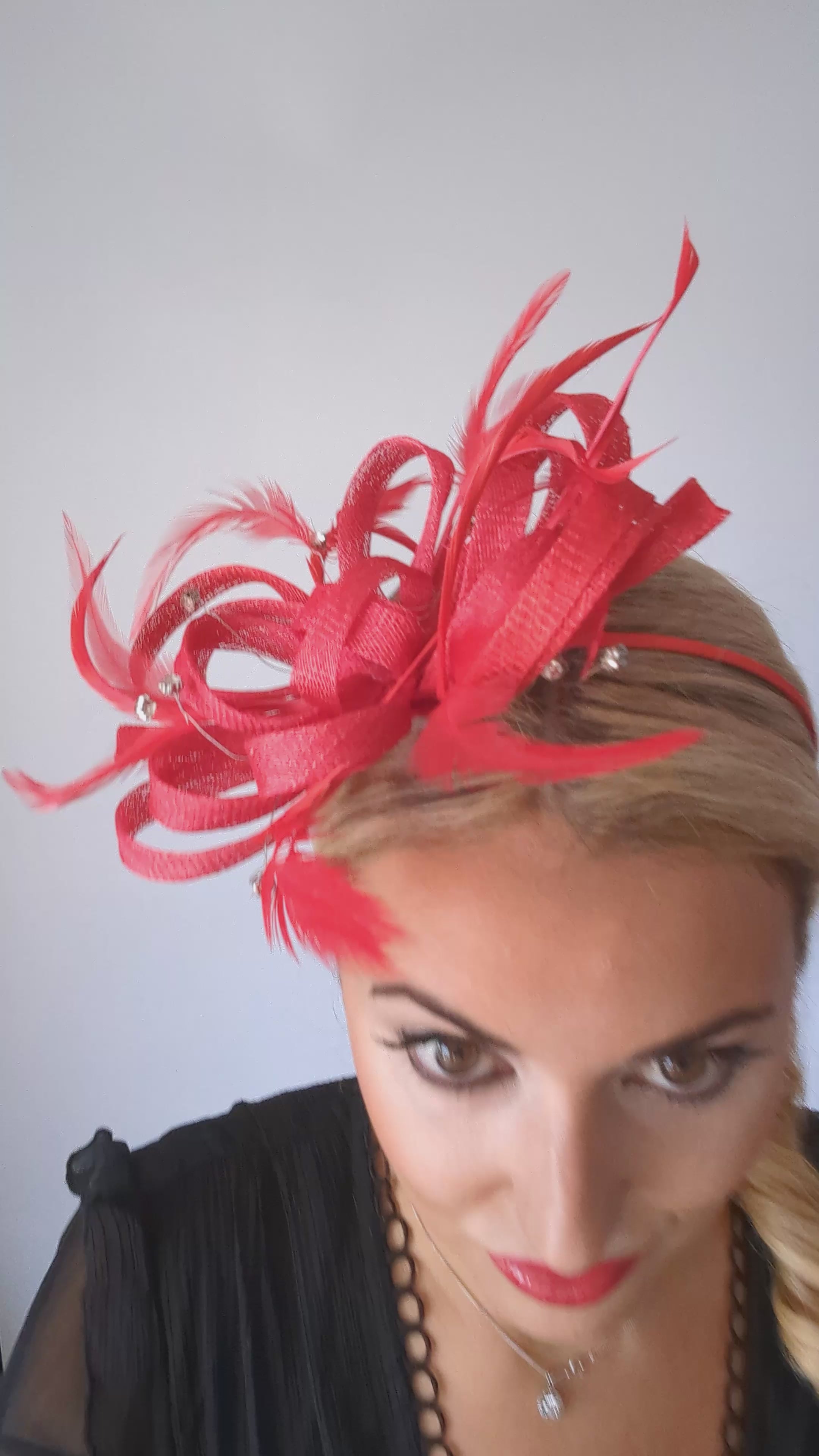 Red crystal feather fascinator hat Red crystal feather fascinator hat