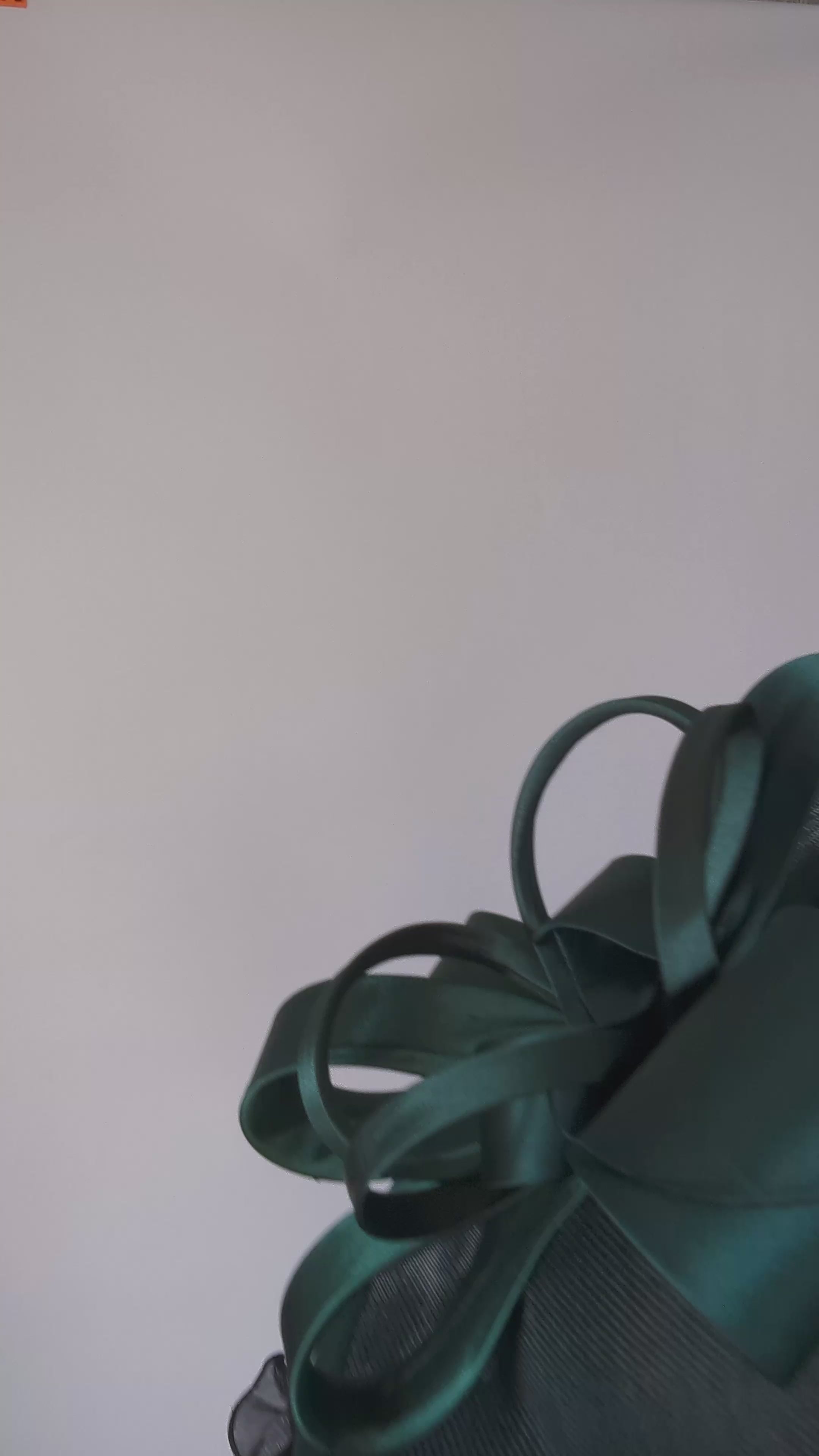 Dark emerald green feather large saucer disc fascinator hat Dark emerald green feather large saucer disc fascinator hat