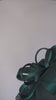 Dark emerald green feather large saucer disc fascinator hat Dark emerald green feather large saucer disc fascinator hat