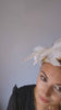 Gold glitter feather fascinator hat Gold glitter feather fascinator hat