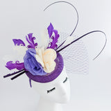 Cadbury purple flower feather fascinator hat