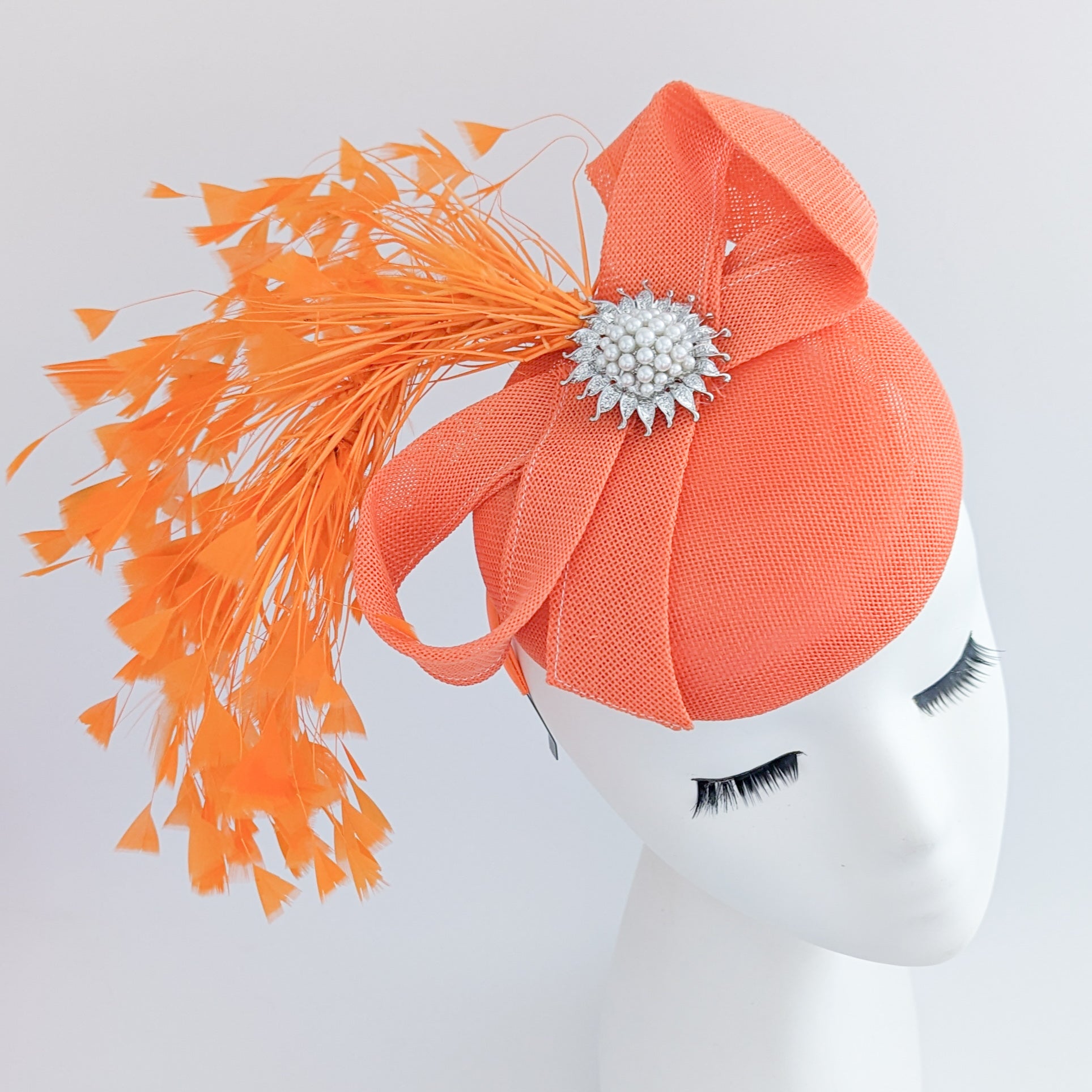 Coral orange feather pearl fascinator hat