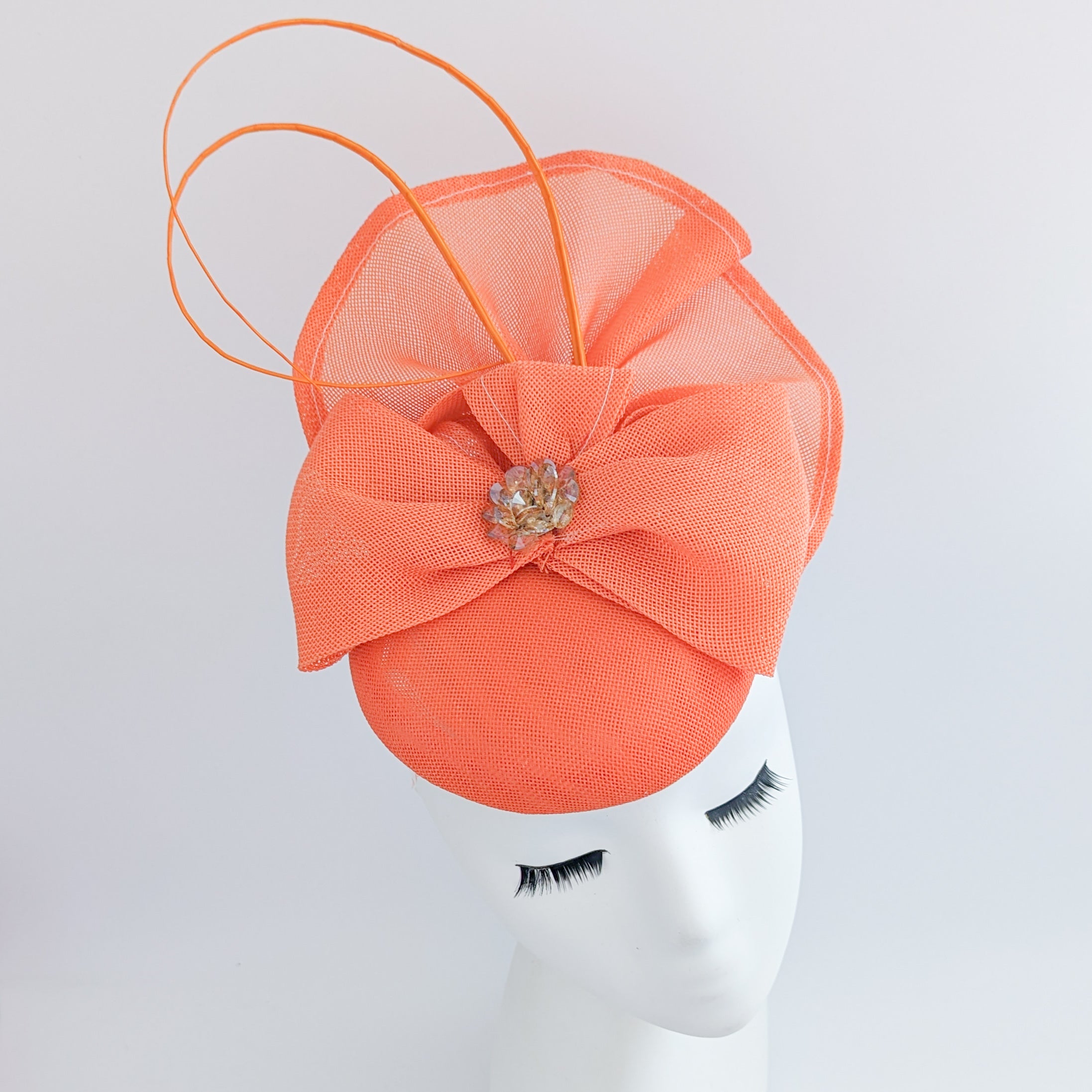 Coral orange crystal bow fascinator hat