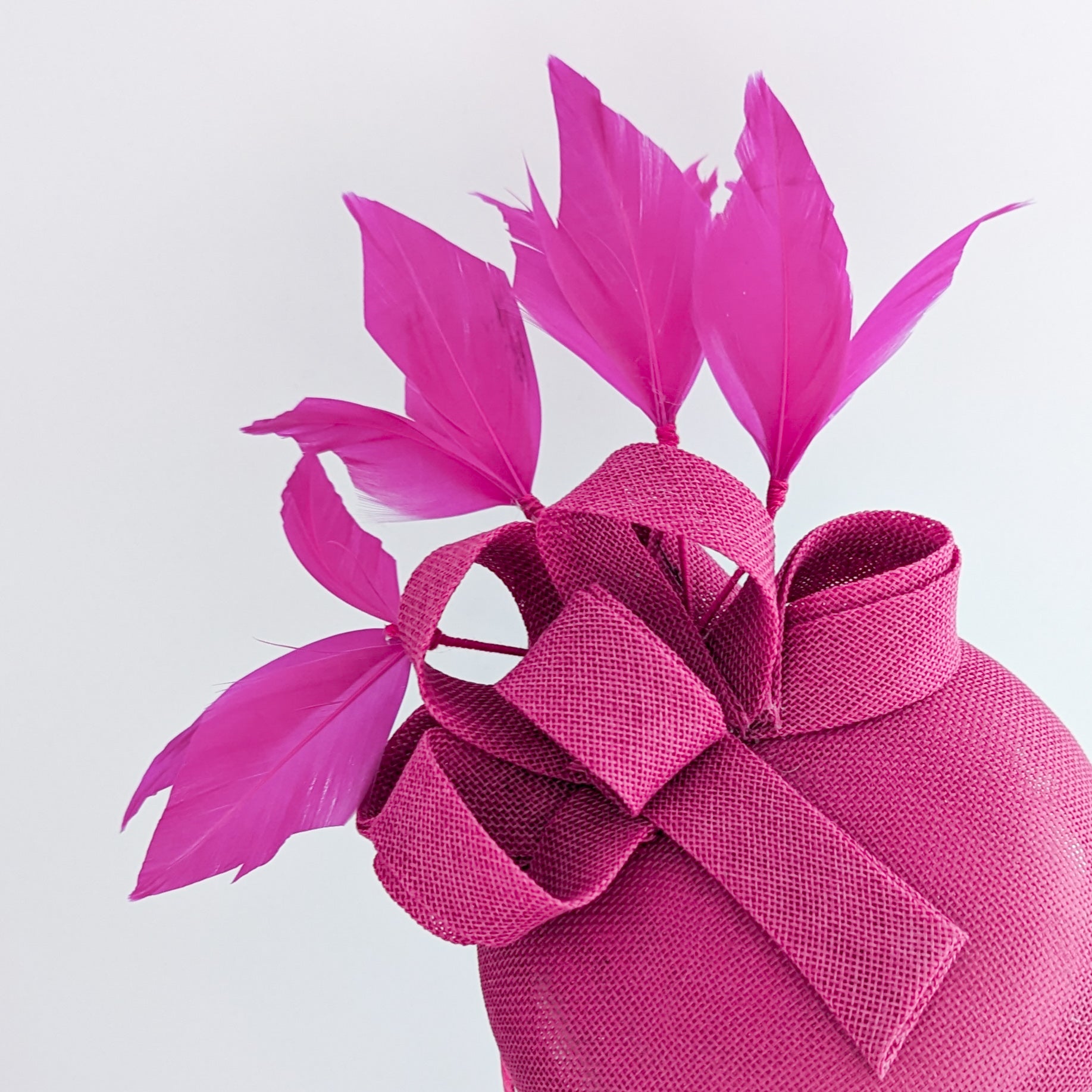 Fuchsia pink feather fascinator hat