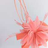 Coral orange feather fascinator hat