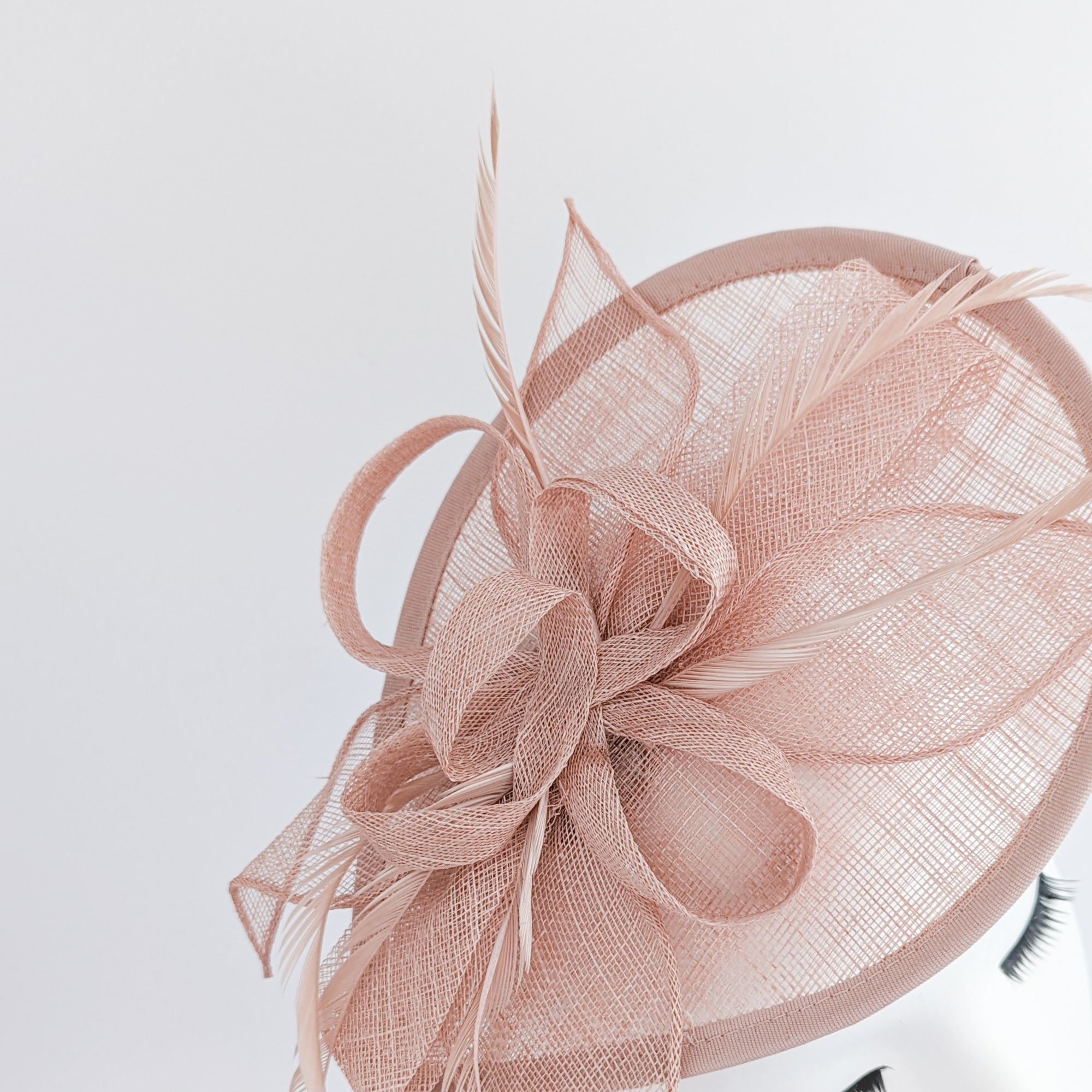 Blush pink feather teardrop fascinator hat