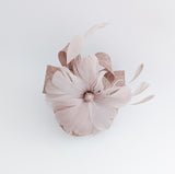 Blush pink feather fascinator hat