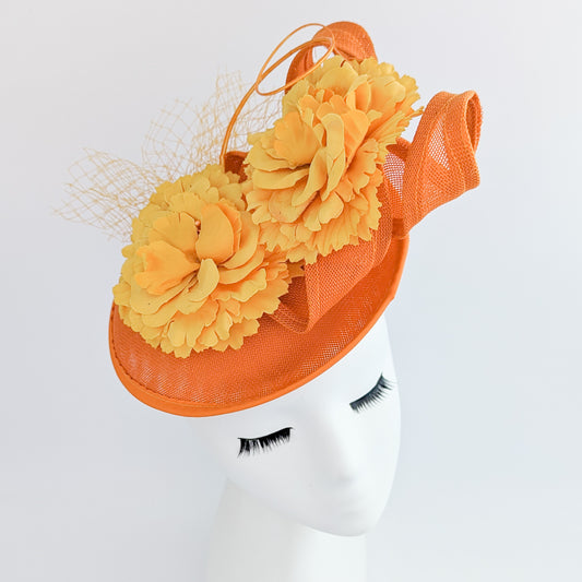 Orange flower fascinator disc saucer hat