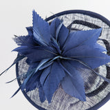 Navy blue feather disc saucer fascinator hat