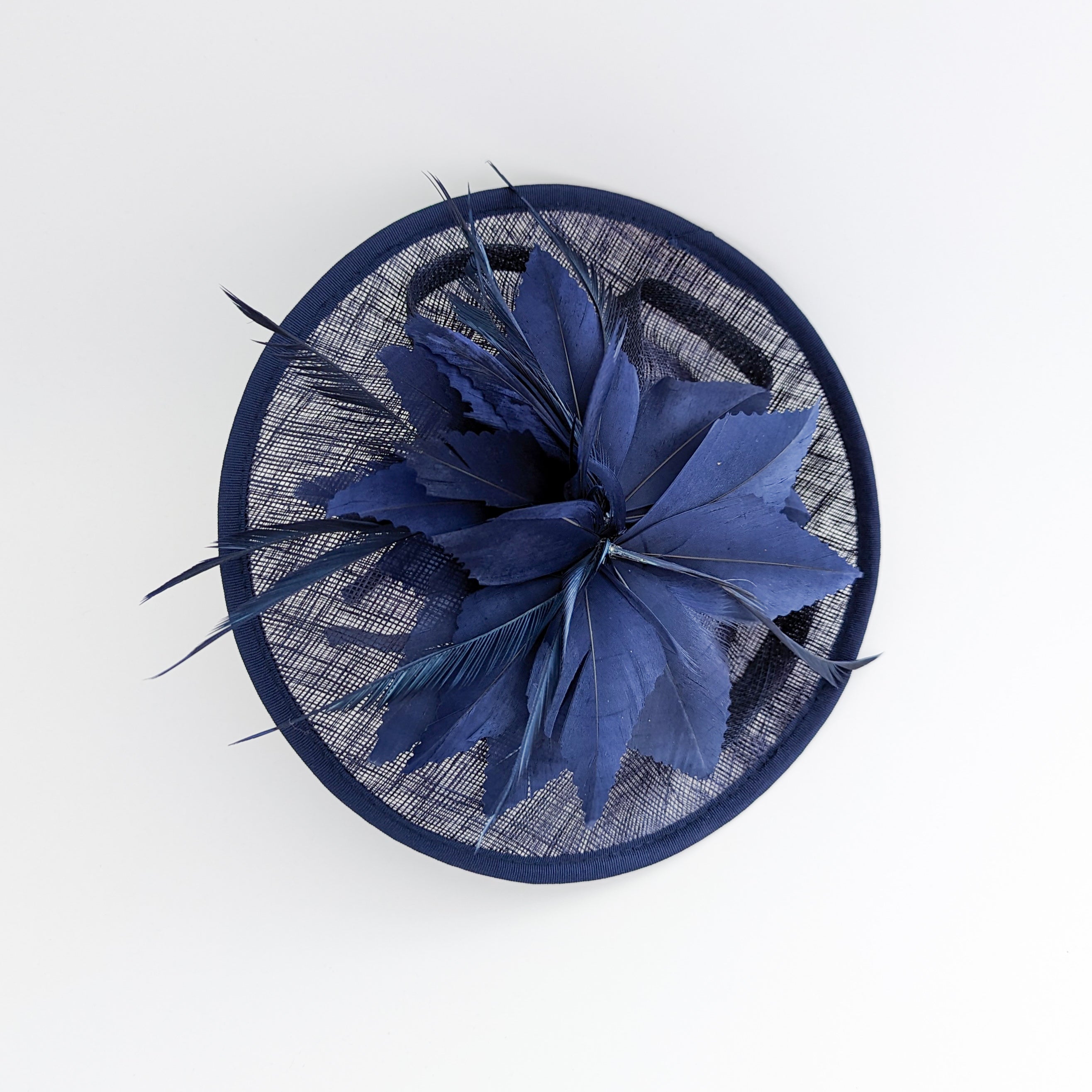 Navy blue feather disc saucer fascinator hat