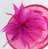 Fuchsia pink feather disc saucer fascinator hat