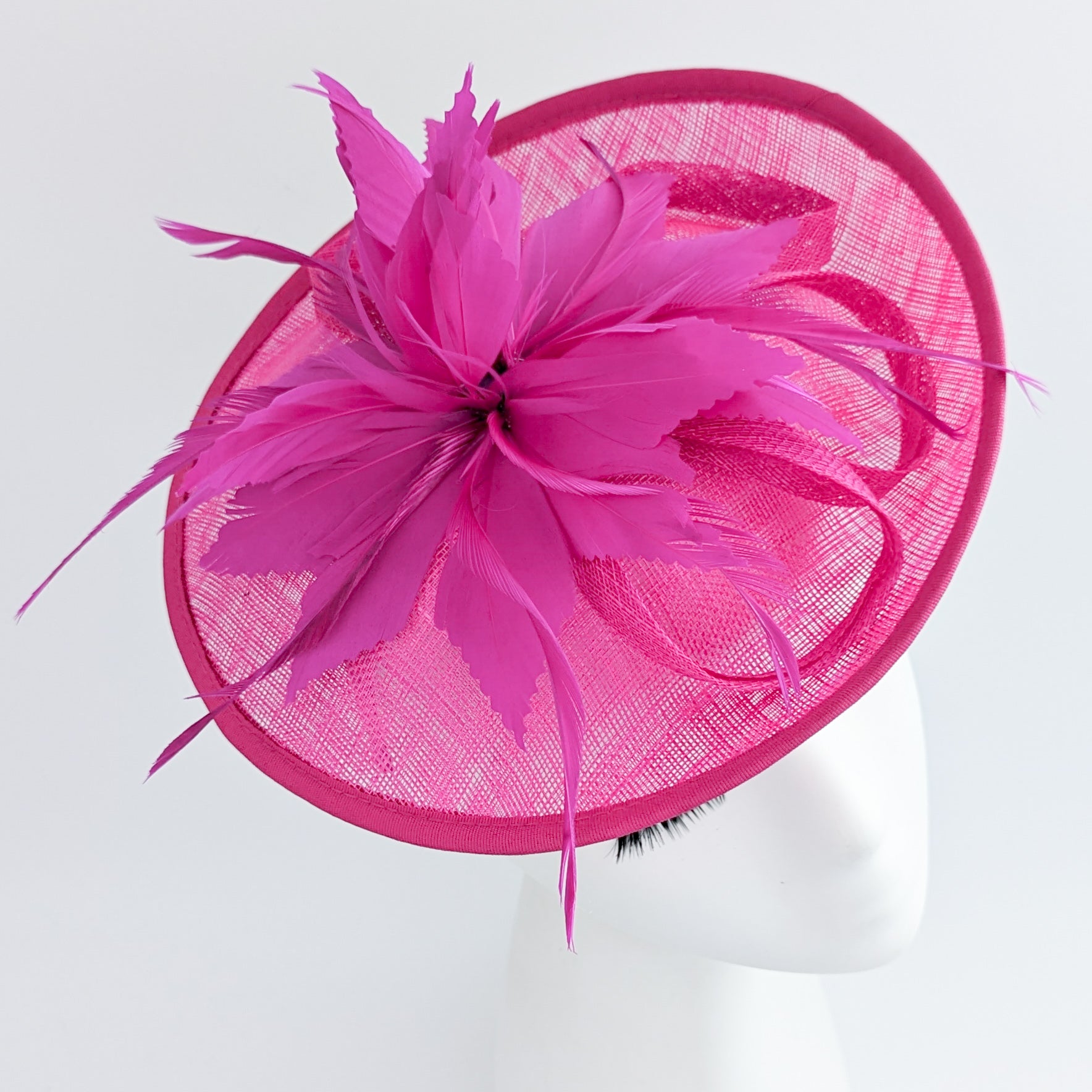 Fuchsia pink feather disc saucer fascinator hat