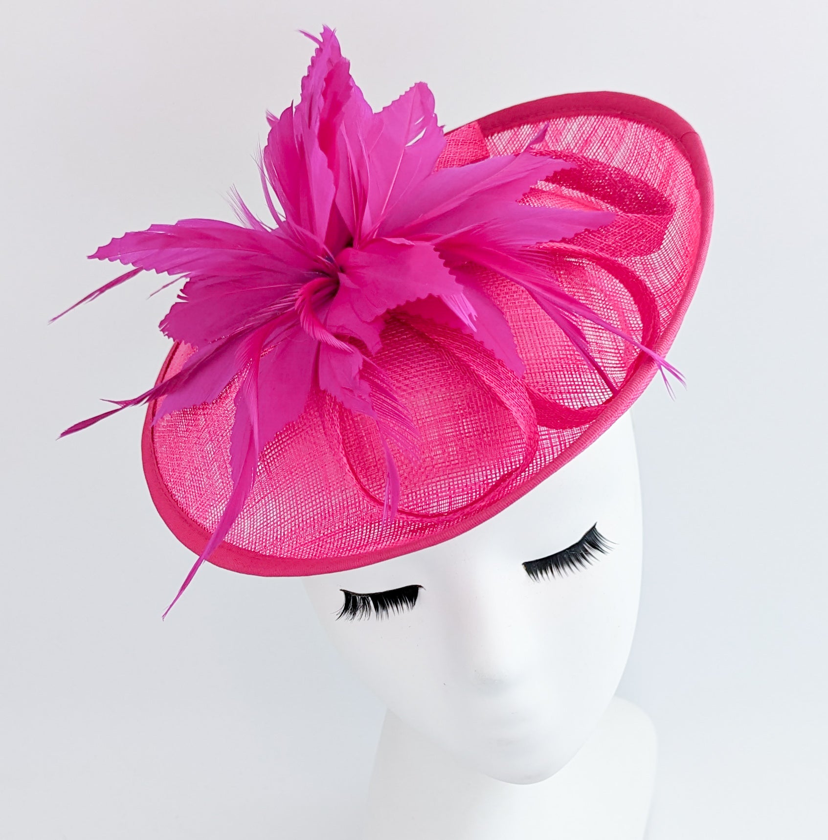 Fuchsia pink feather disc saucer fascinator hat