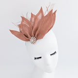 Terracotta dusty pink feather petal fan fascinator hat